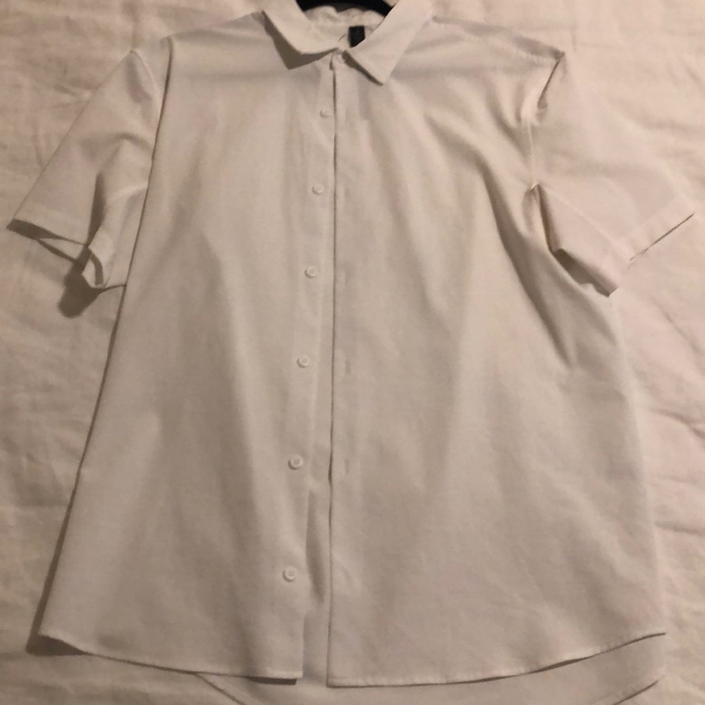 Lululemon men’s white shortsleeved large